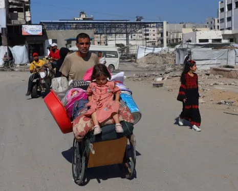 Running from Death to Peril: Gaza City Inhabitants Grapple with Heart-Wrenching Decision